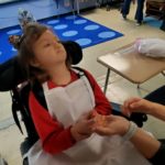 young white female student in a wheelchair