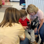 Teacher working with a male student